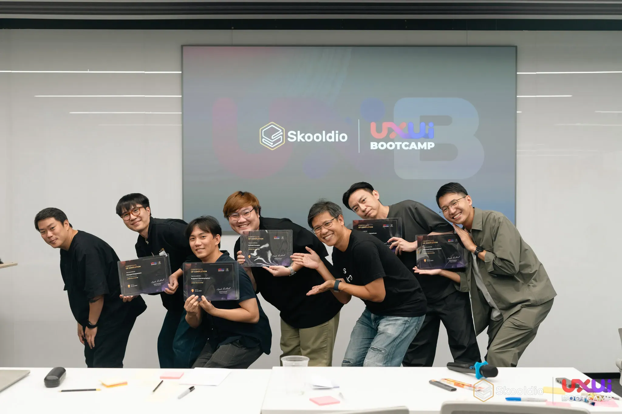 Group project team winners with certificates